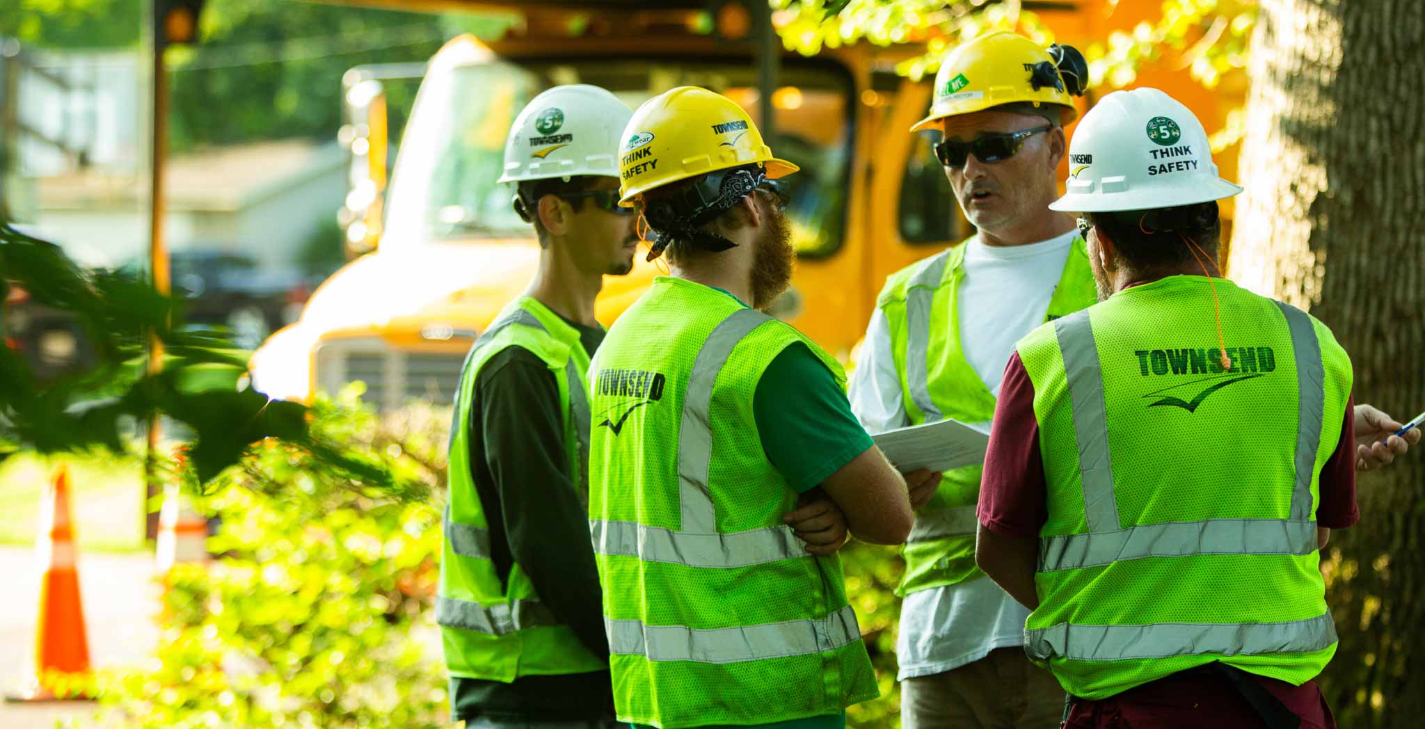 A group of Townsend employees discussing a job